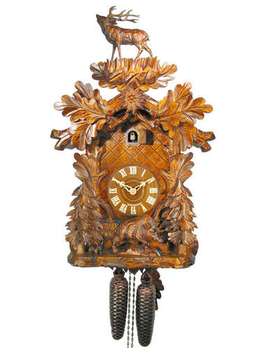 Cuckoo clock with carved Stag and Boar