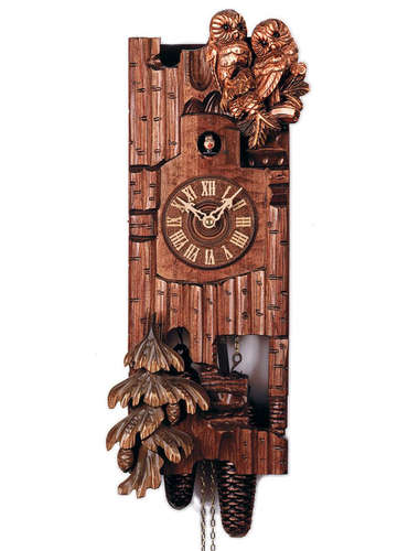 Cuckoo clock in the style of a tree trunk, with nesting Owls