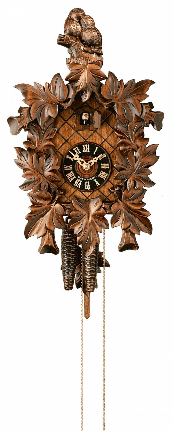 Cuckoo clock, with hand carved Bird and leaves