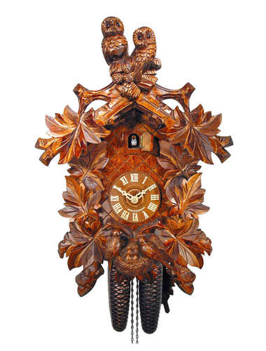 Cuckoo clock with carved Owls