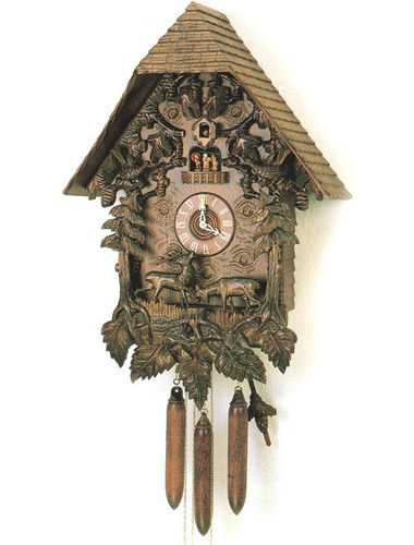 Heavily carved Cuckoo clock