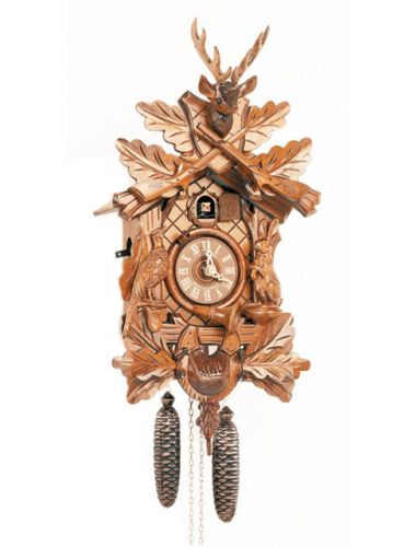 Carved Cuckoo clock in a Honey finish